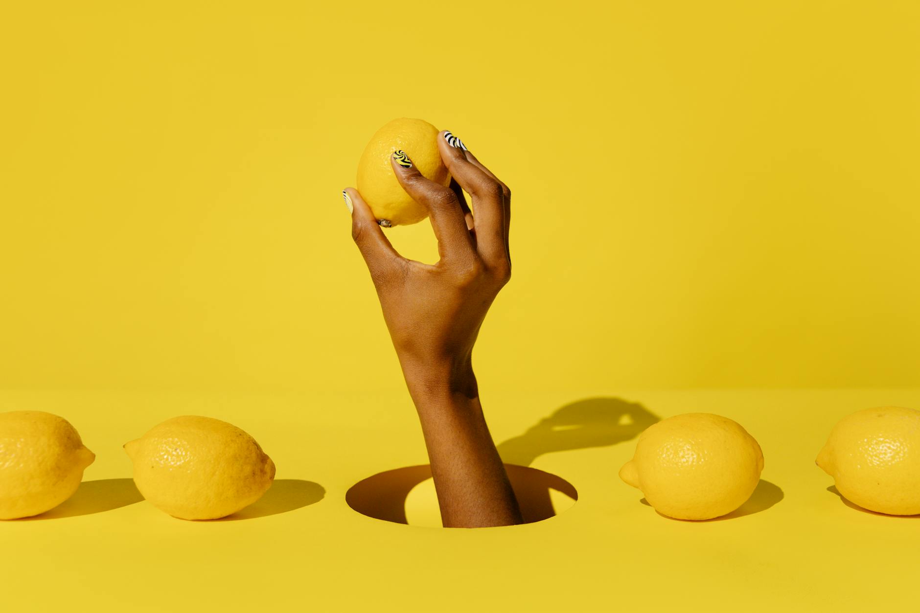 A woman holding two colorful clitoral vibrators, reclaiming pleasure without guilt
