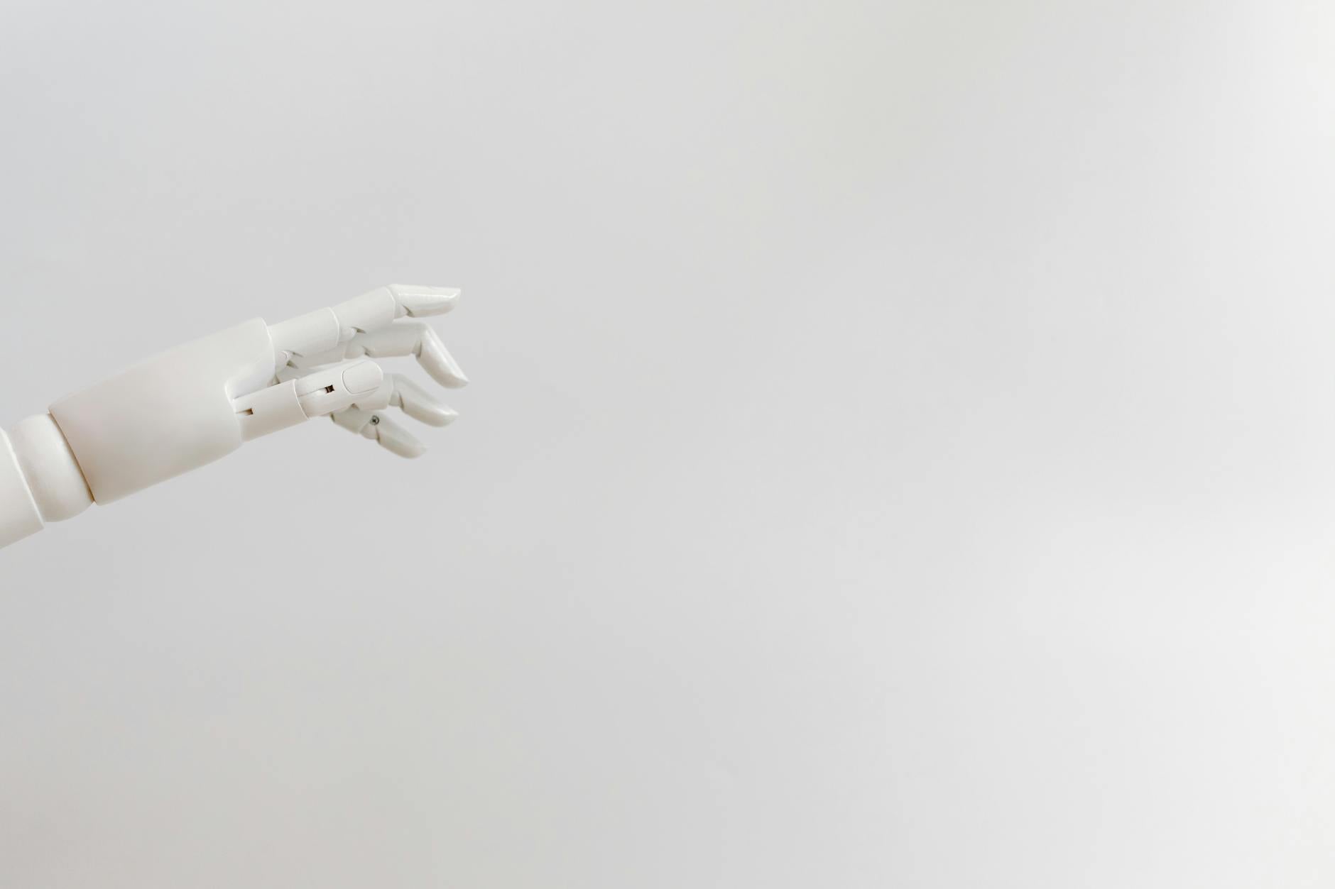 A robotic arm offers a flower to a woman in a display of technology and human connection.